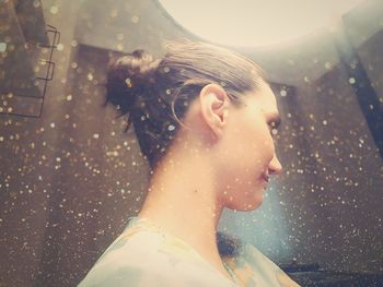 Close-up of young woman in water