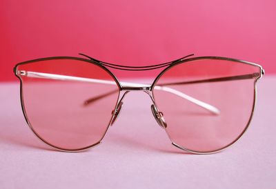 Close-up of sunglasses against white background