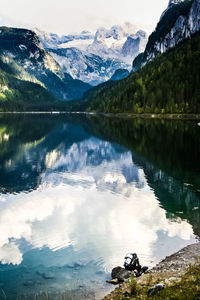 Scenic view of lake with mountains reflection