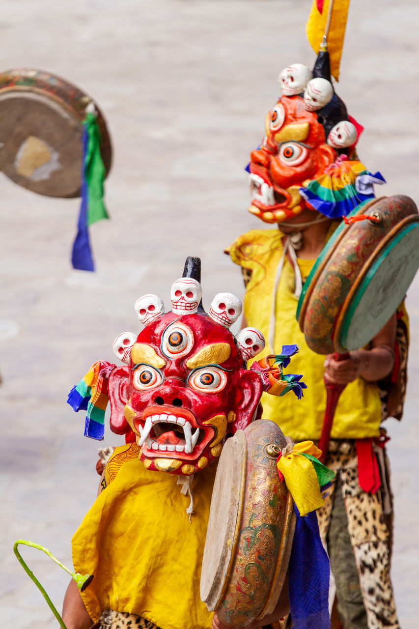 CLOSE-UP OF TOYS IN TRADITIONAL CLOTHING