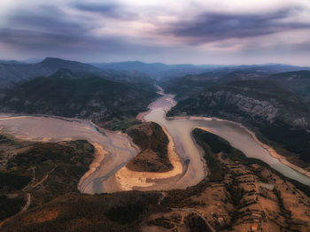 Aerial view of landscape against sky during sunset