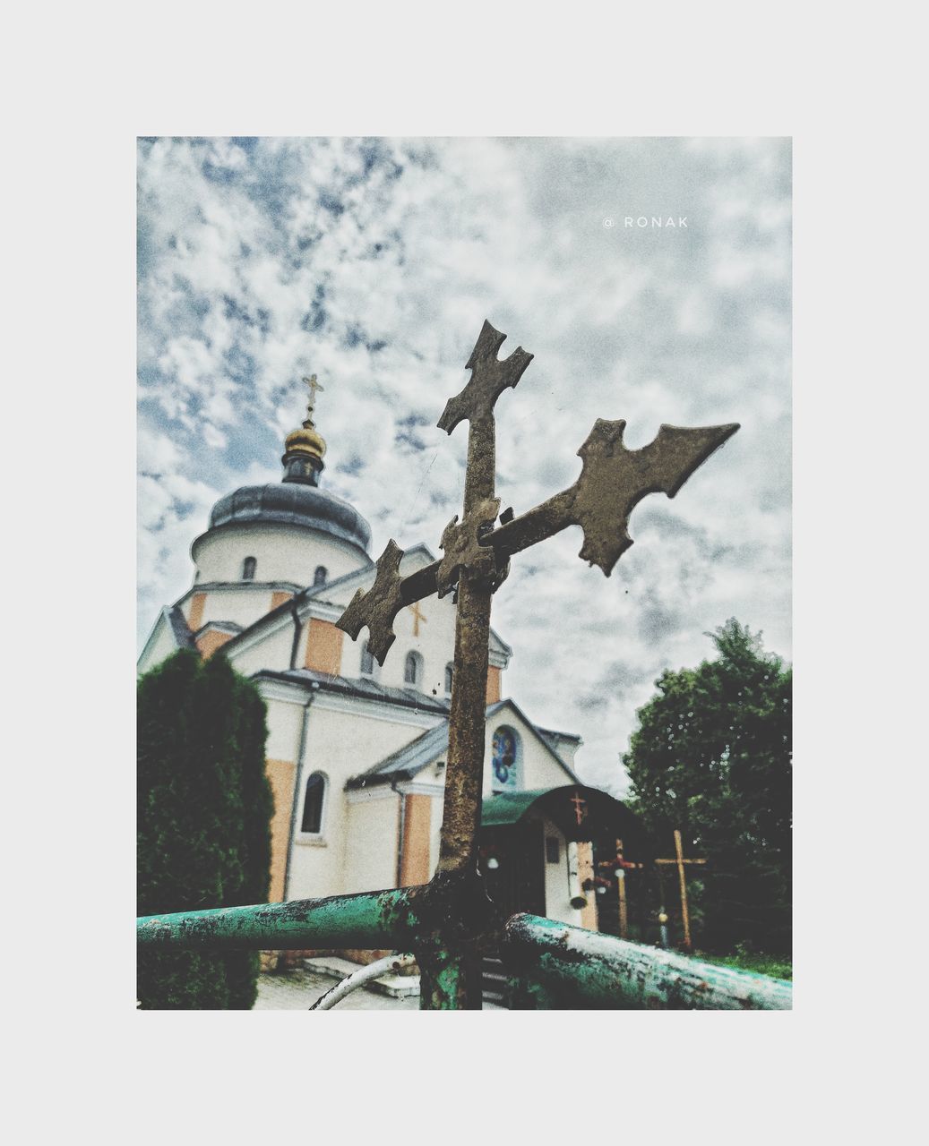 architecture, built structure, building exterior, sky, nature, building, religion, tree, no people, cross, belief, day, cloud, outdoors, art, place of worship, auto post production filter, spirituality, transfer print, plant, history, the past, city, catholicism, low angle view