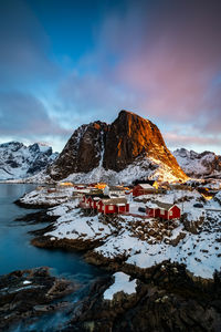 Scenic view of snowcapped mountains against sky during winter