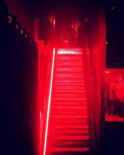 Illuminated staircase at night