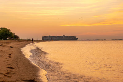 Big container ship crossing the chesapeake bay, view from sandy point state park 