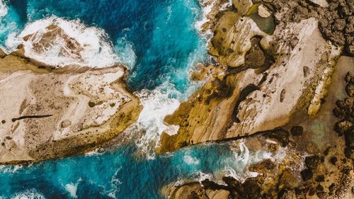 High angle view of rocks on beach