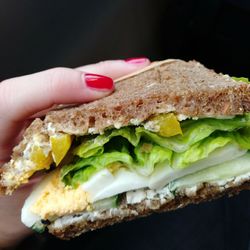 Close-up of hand holding bread