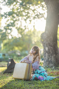 Woman sitting in park