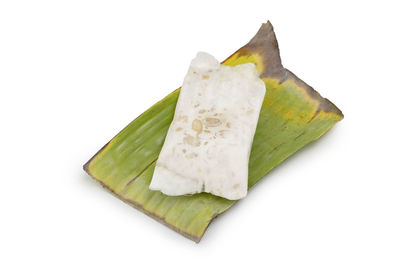 High angle view of leaf on white background