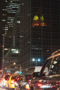 Traffic on road in city at night