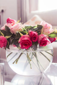 Close-up of roses on table