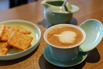 Close-up of coffee served on table