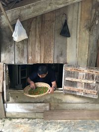 Man preparing food on barbecue grill