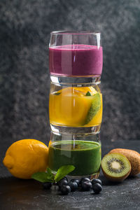 Orange juice in glass jar on table