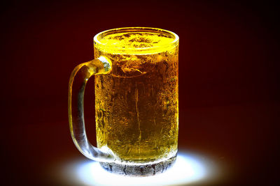 Close-up of beer glass on table