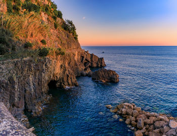 Scenic view of sea against sky during sunset