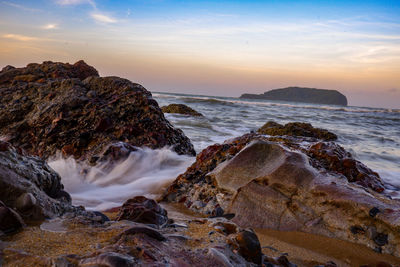 Scenic view of sea against sky during sunset