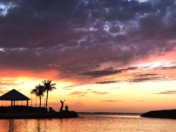Scenic view of sea against sky at sunset