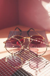 Close-up of eyeglasses on table