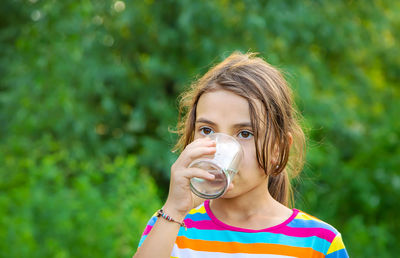 Young woman drinking water