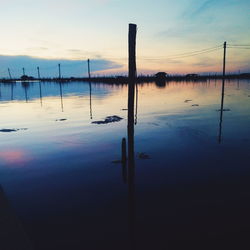 Scenic view of sea at sunset