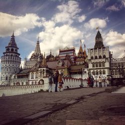 Low angle view of temple against cloudy sky