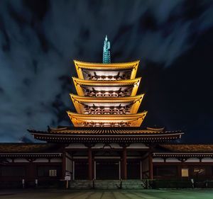 Low angle view of temple against sky at night