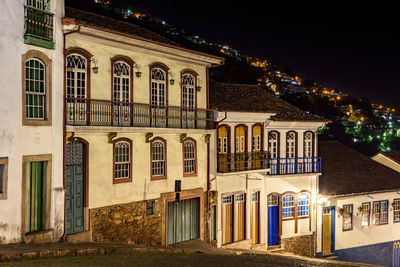 Low angle view of illuminated building at night