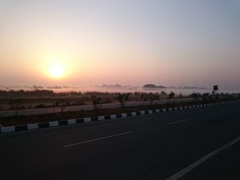 Scenic view of landscape at sunset