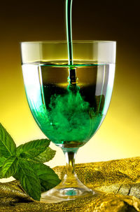 Close-up of wine glass on table