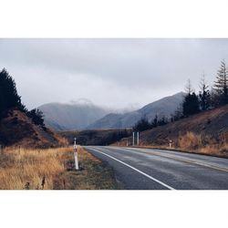 Country road passing through landscape