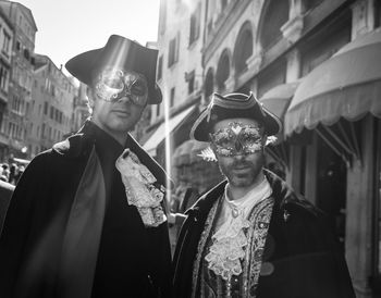 Man standing by mask