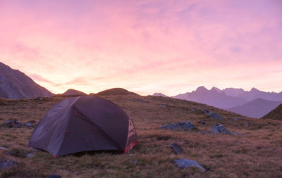 Scenic view of mountains against sky during sunset