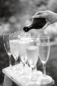 Cropped hand of woman holding wineglass