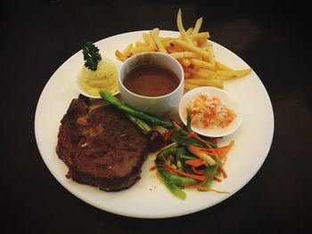 Close-up of served food in plate