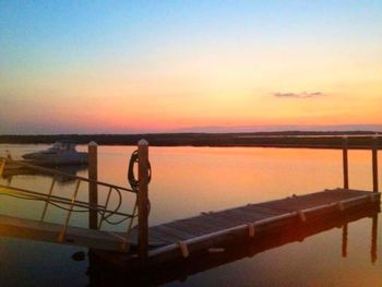 Scenic view of lake at sunset