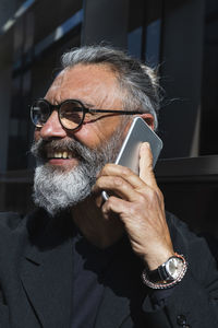 Portrait of man wearing eyeglasses