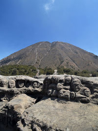 Scenic view of landscape against clear blue sky