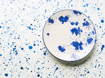 Close-up of water drops on white background