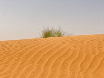 Scenic view of desert against clear sky