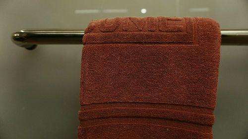 Close-up of open book on table at home