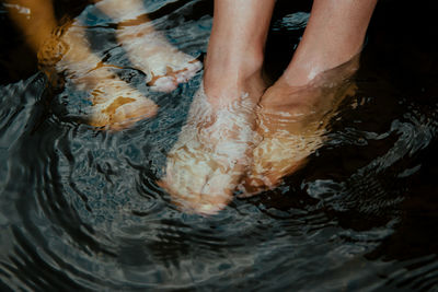 Feet in the water relaxing time