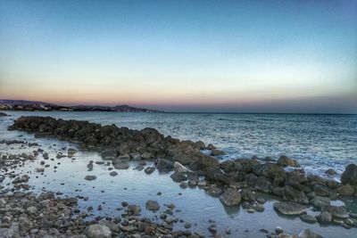 Scenic view of sea against clear sky