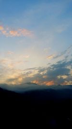 Scenic view of silhouette landscape against sky during sunset