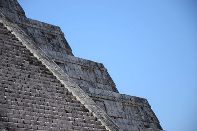 Low angle view of fort against blue sky