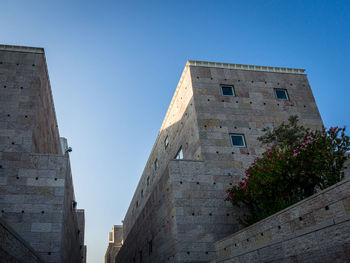 Low angle view of building against clear sky