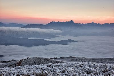 Scenic view of mountains against sky during sunset