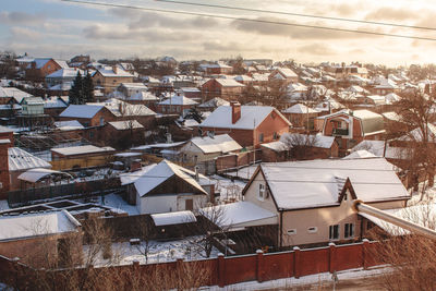 Cityscape against sky during winter