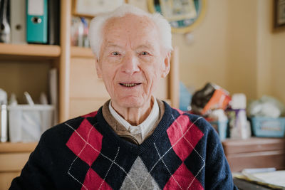 Portrait of smiling man at home