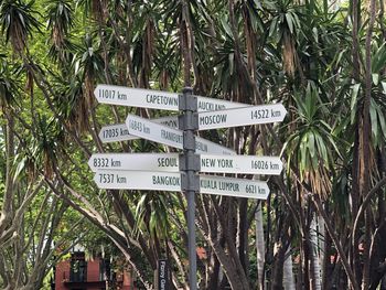 Information sign against trees